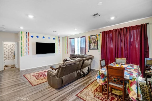 living room with hardwood / wood-style flooring