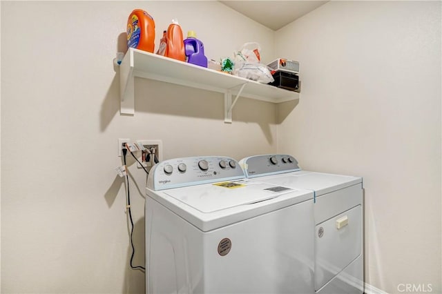 washroom featuring separate washer and dryer