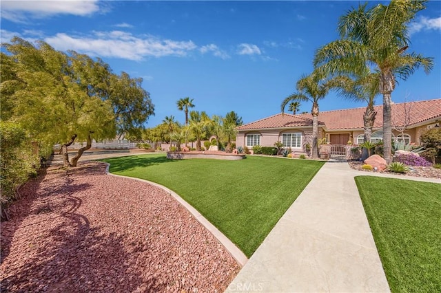 exterior space featuring a front yard