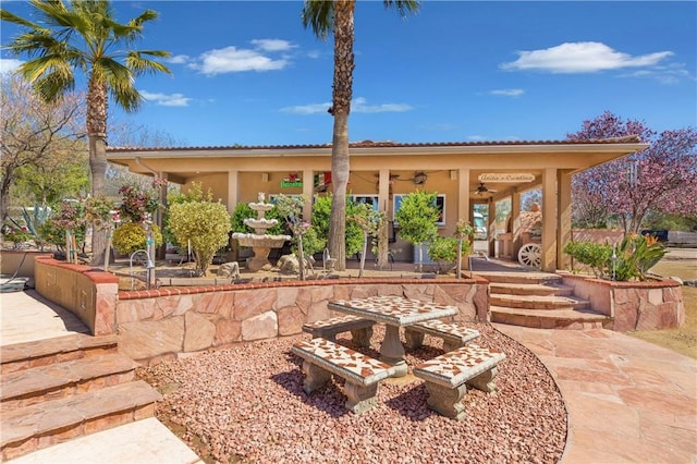 view of patio with ceiling fan