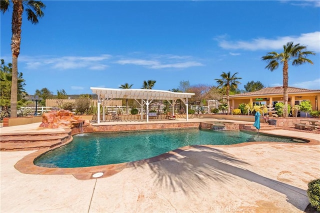 view of pool featuring an in ground hot tub and a patio