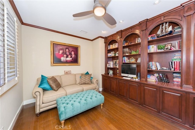 interior space with crown molding, plenty of natural light, ceiling fan, and hardwood / wood-style flooring