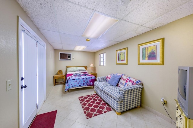 bedroom featuring a paneled ceiling