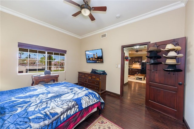 bedroom with dark wood-type flooring, ceiling fan, and ornamental molding