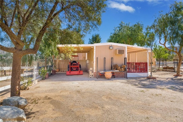 exterior space featuring a carport