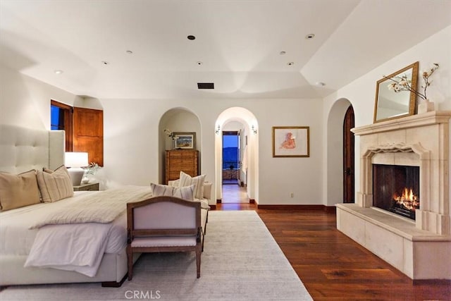 bedroom featuring dark hardwood / wood-style flooring