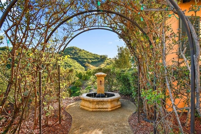 view of patio / terrace with a mountain view