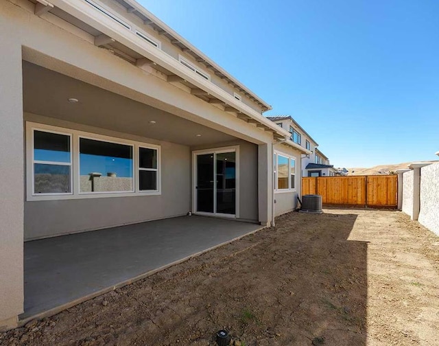 rear view of house with a patio