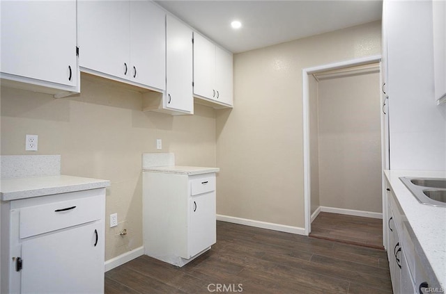6454 Goleta Ave, Yucca Valley, CA 92284 - kitchen featuring dark wood-style flooring, white cabinets, baseboards, and recessed lighting