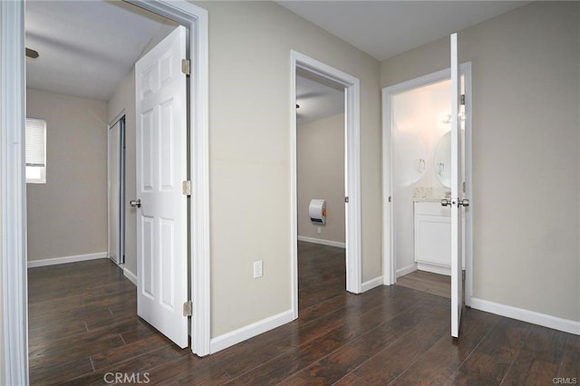 6454 Goleta Ave, Yucca Valley, CA 92284 - hallway with dark wood-type flooring and baseboards