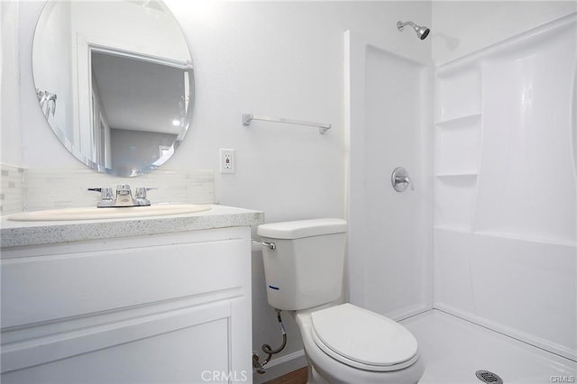 6454 Goleta Ave, Yucca Valley, CA 92284 - full bathroom featuring a shower, vanity, toilet, and backsplash