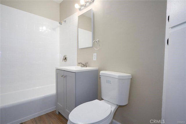 6454 Goleta Ave, Yucca Valley, CA 92284 - bathroom featuring toilet, vanity, shower / washtub combination, and wood finished floors