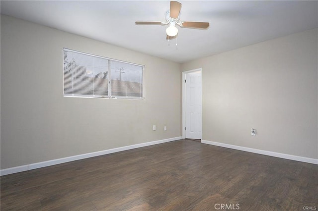 6454 Goleta Ave, Yucca Valley, CA 92284 - empty room featuring dark wood-type flooring, baseboards, and a ceiling fan