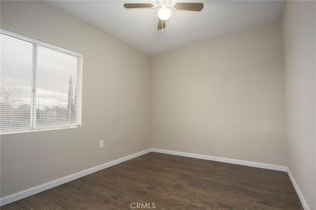 6454 Goleta Ave, Yucca Valley, CA 92284 - empty room featuring healthy amount of natural light, baseboards, and dark wood-style flooring