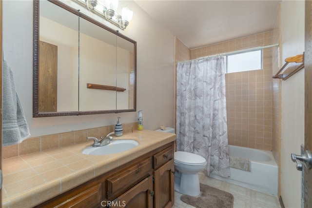 full bathroom featuring vanity, shower / bath combo, toilet, and tile patterned flooring