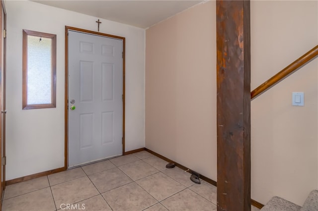 entrance foyer with light tile patterned flooring