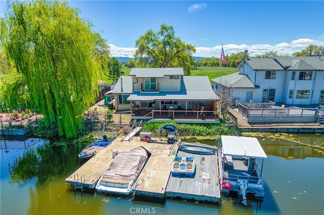 dock area with a deck with water view