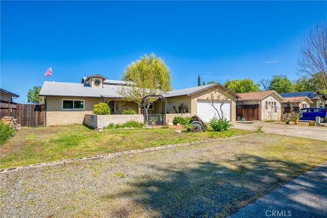 single story home with a garage and a front lawn