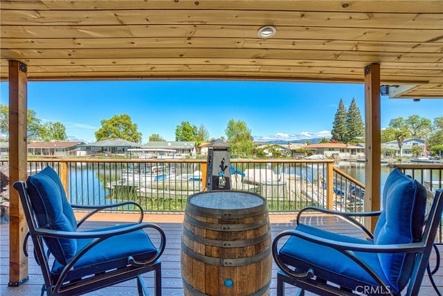 view of patio with a water view