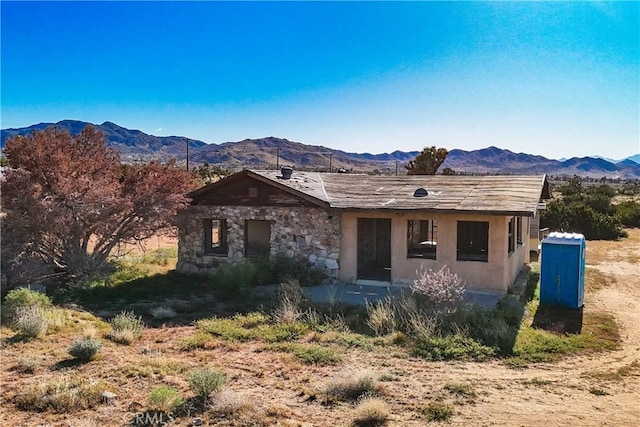 ranch-style house with a mountain view