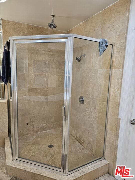 bathroom with walk in shower