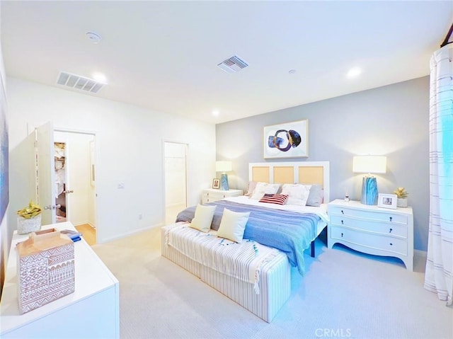 bedroom featuring light colored carpet