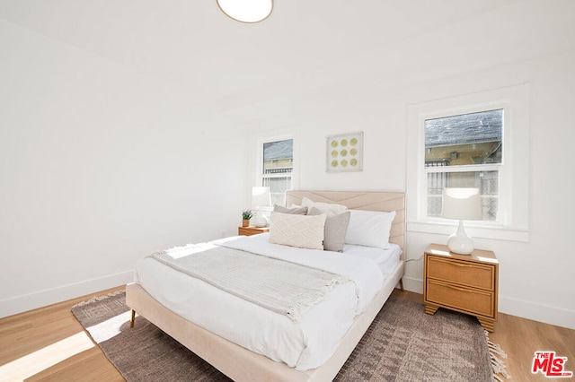 bedroom featuring hardwood / wood-style floors