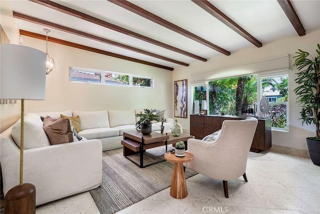 living room featuring vaulted ceiling with beams and a notable chandelier