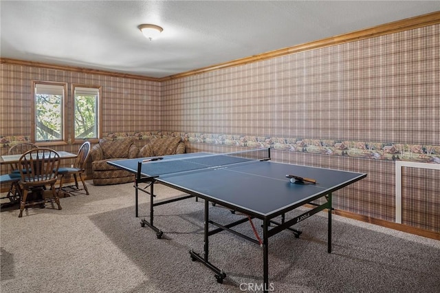 game room with carpet flooring and ornamental molding