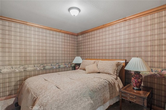 carpeted bedroom with a textured ceiling