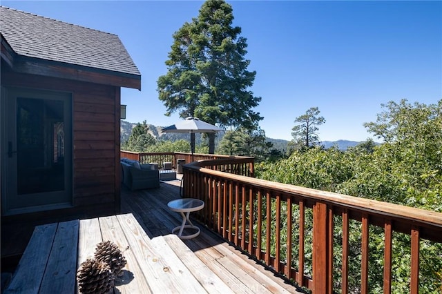 deck featuring a mountain view