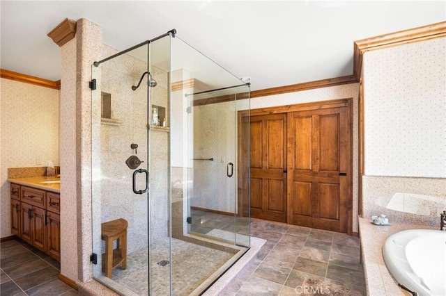 bathroom with vanity, shower with separate bathtub, and crown molding