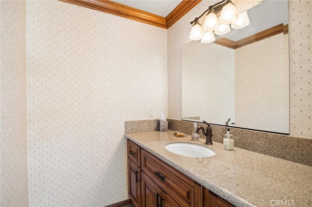 bathroom featuring vanity and ornamental molding