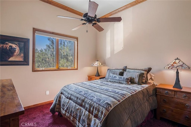 bedroom featuring dark carpet, ceiling fan, and ornamental molding