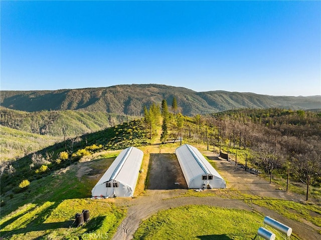 exterior space featuring a mountain view