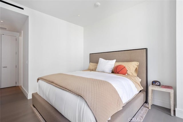 bedroom featuring light wood-type flooring