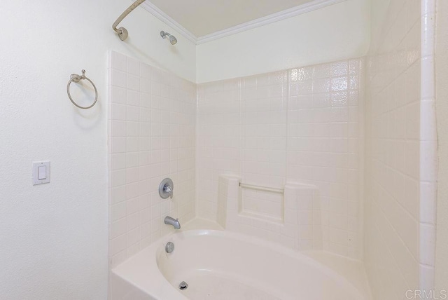 bathroom featuring ornamental molding and tub / shower combination