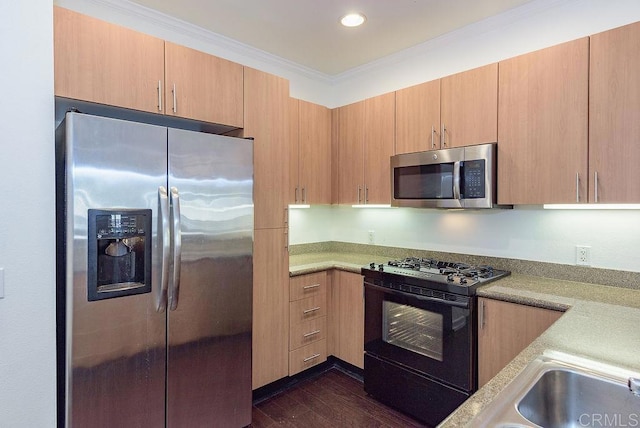 kitchen featuring light brown cabinets, dark hardwood / wood-style flooring, stainless steel appliances, and crown molding