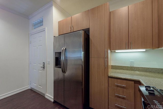 kitchen featuring stone counters, stainless steel refrigerator with ice dispenser, dark hardwood / wood-style floors, and ornamental molding