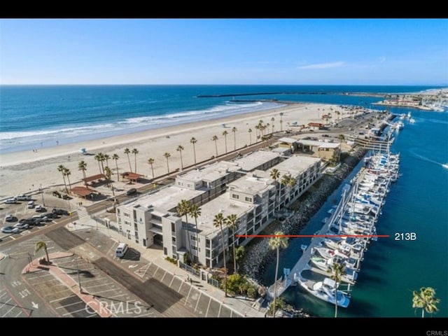 aerial view featuring a beach view and a water view