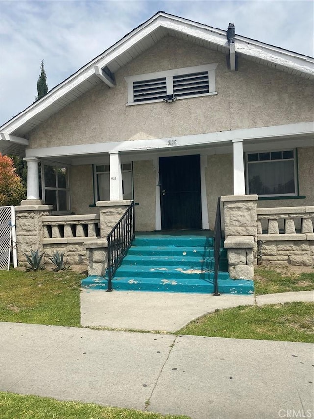 view of front of house featuring covered porch