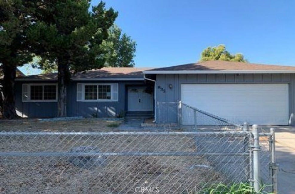 ranch-style home with a garage