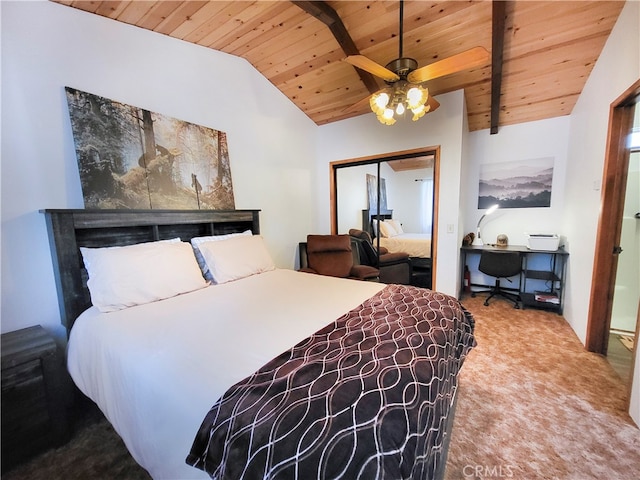 bedroom with a fireplace, ceiling fan, a closet, wood ceiling, and carpet floors