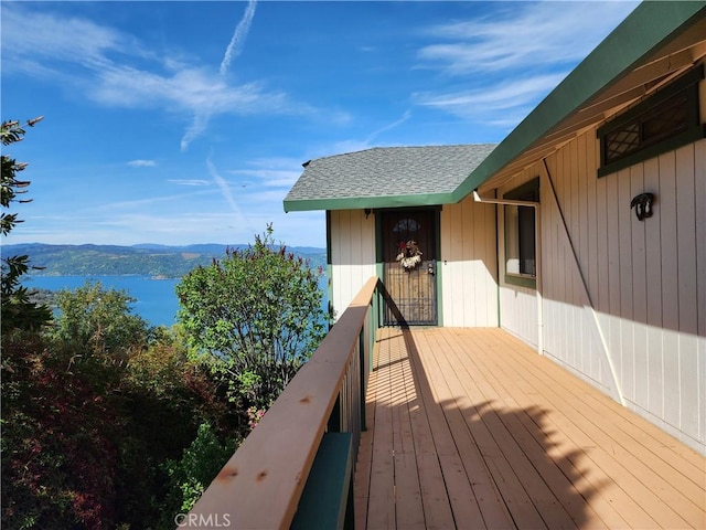 wooden deck featuring a mountain view