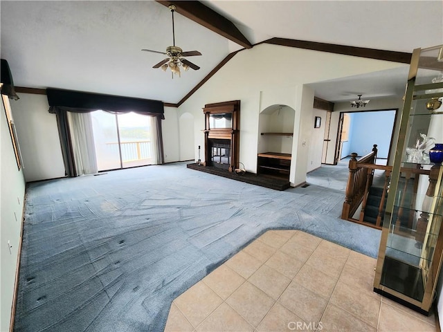 living room with light carpet, lofted ceiling with beams, and ceiling fan