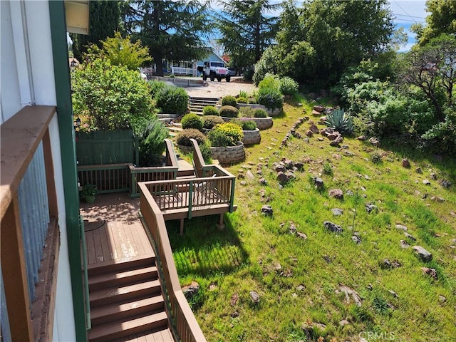 view of yard featuring a wooden deck