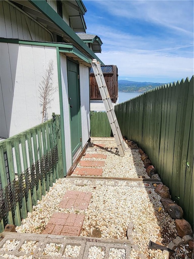 exterior space with a water view