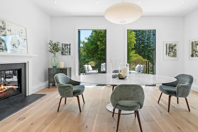 sitting room with light hardwood / wood-style floors