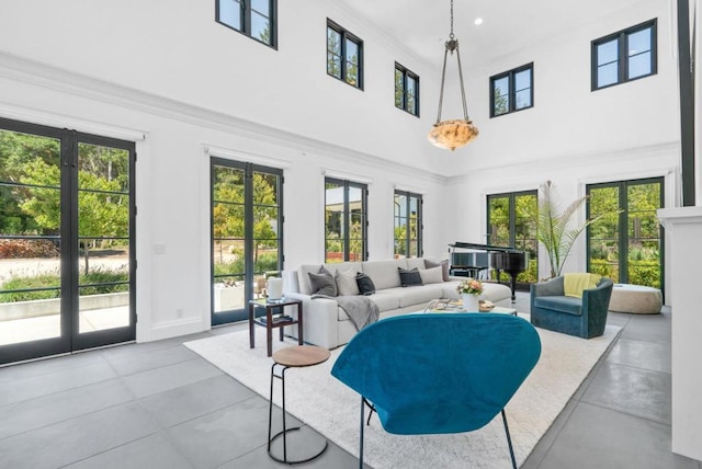 sunroom / solarium with a wealth of natural light and french doors