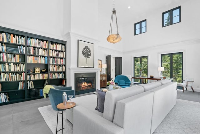 living room with a towering ceiling